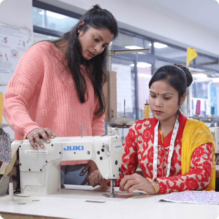 A lady apparel trainer teaching students