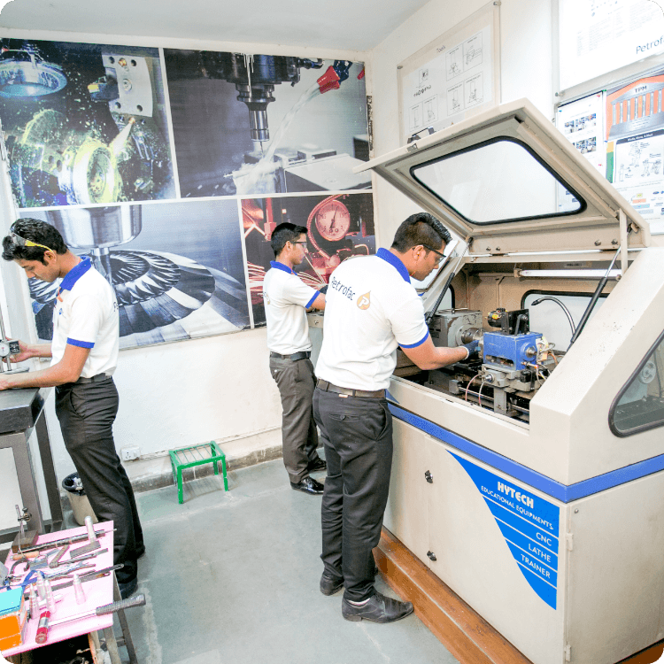 Engineers working on machines